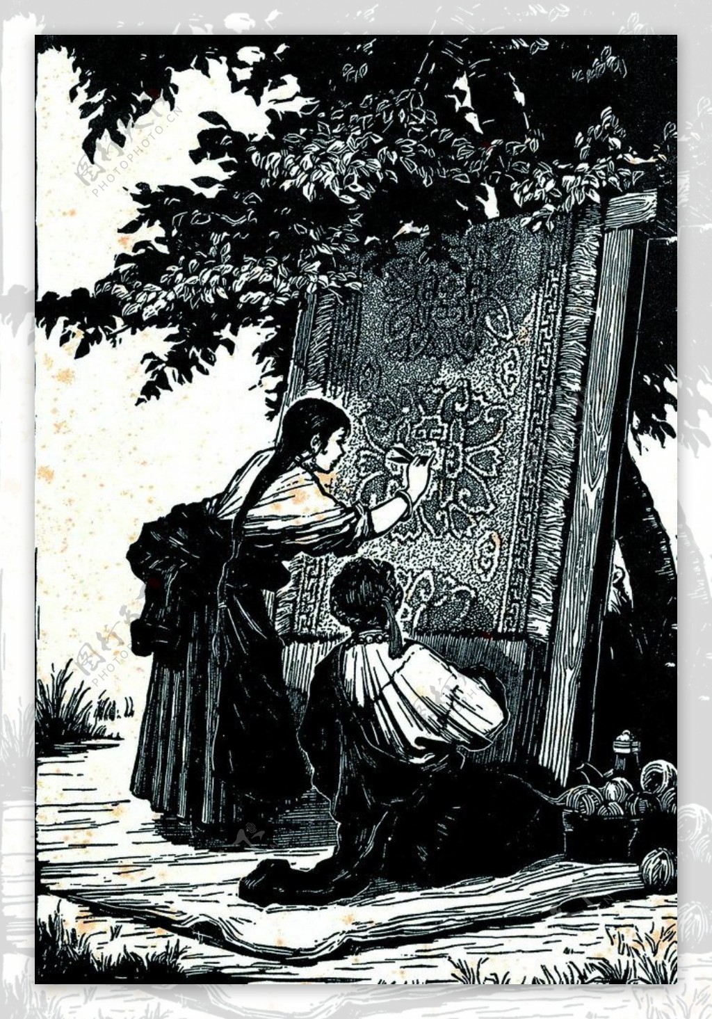 藏族少女织花毯图片