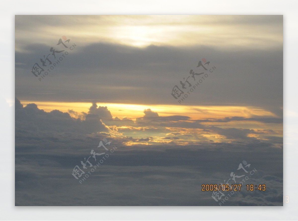 飞机上看夕阳图片