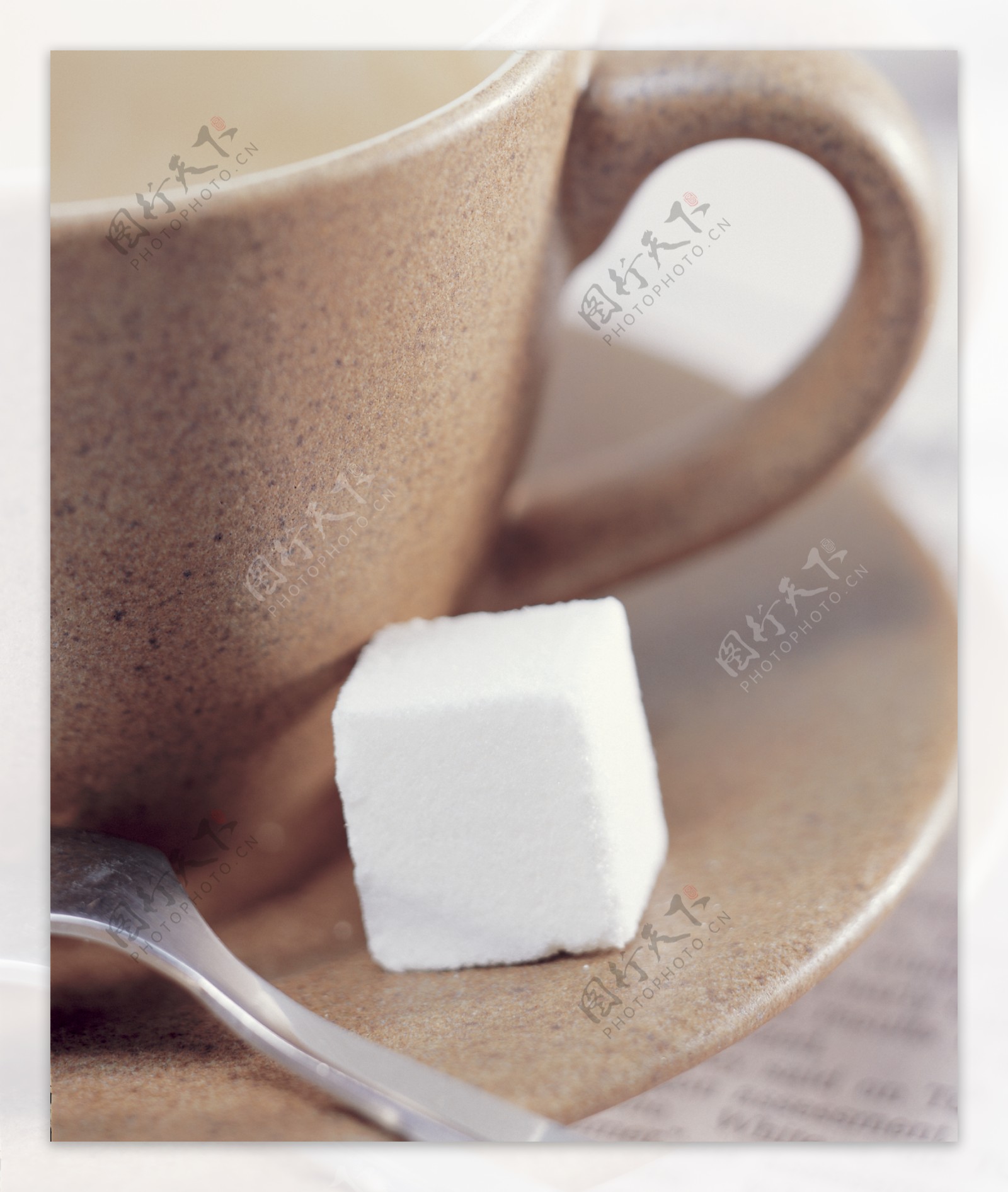 咖啡杯与白糖摄影图片