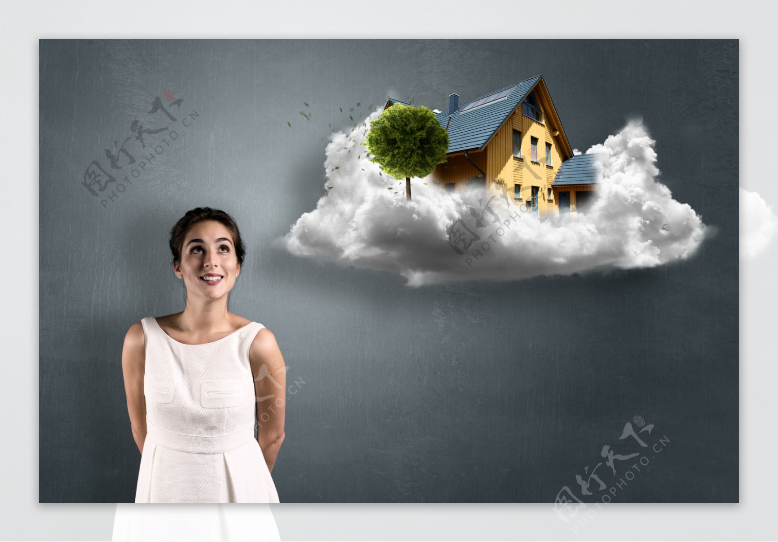女人和云朵上的房子图片