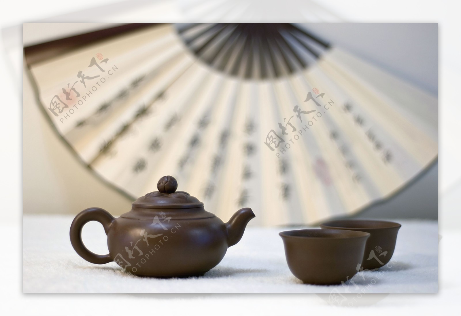 茶壶与扇子