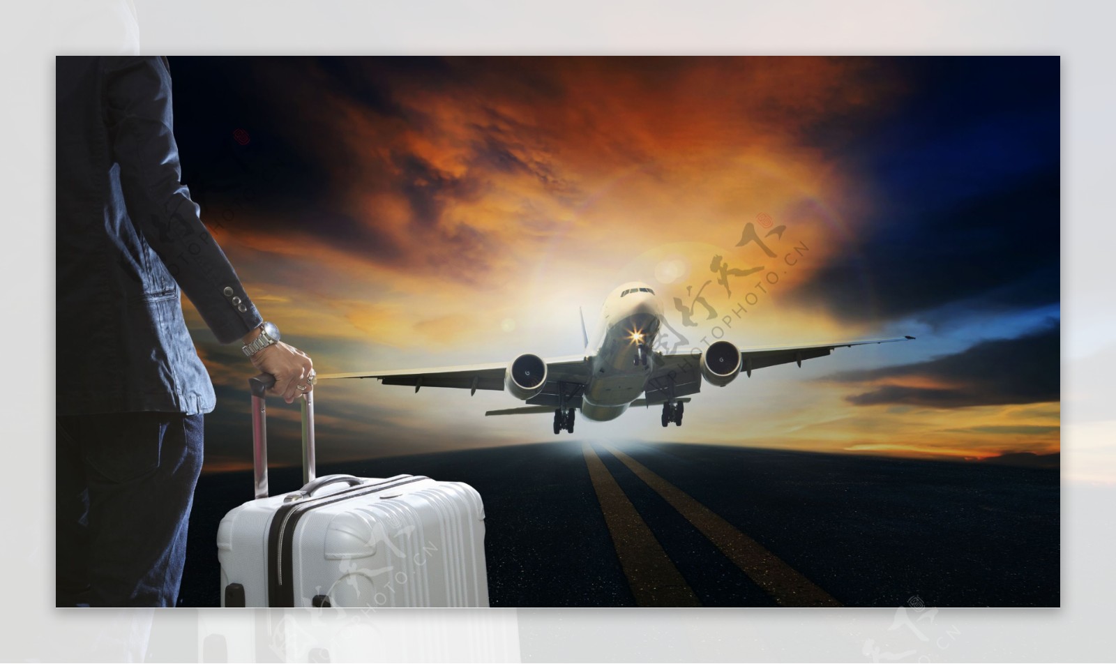 拿行李箱的商务男人和飞机图片