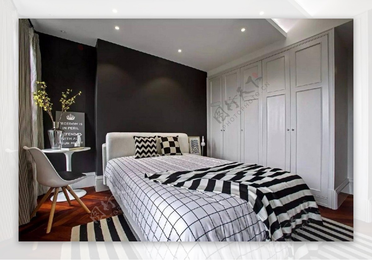 现代时尚卧室黑色背景墙室内装修效果图